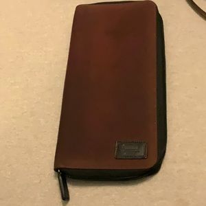 Coach Long Canvas and Leather Passport Organizer Wallet.